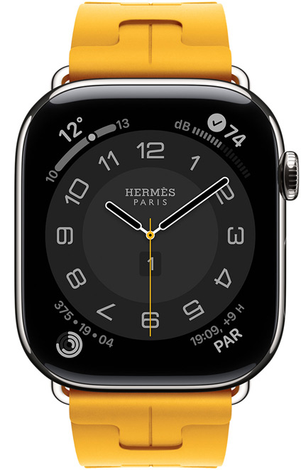Apple Watch Hermès Series 11, cadran Circulaire (aiguilles des heures, des minutes et des secondes, logo Hermès Paris, complications : Météo, anneaux Activité, heure de Paris et Indice UV), bo?tier en titane, argent, c?té droit, Digital Crown, associée au bracelet Simple Tour Kilim, jaune (jaune canari), caoutchouc fluoroélastomère