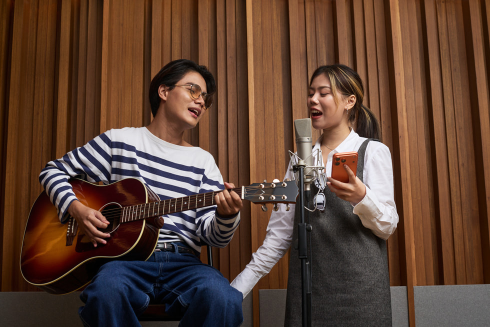 The two members of Yes Indeed jam in the studio.