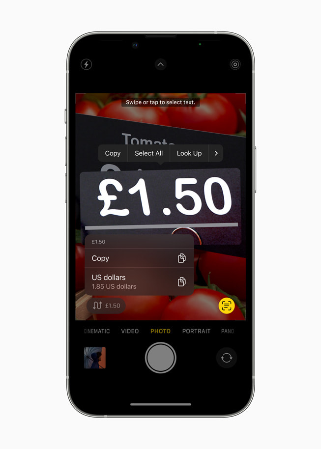 Texte en direct affiché sur un iPhone?13 Pro, effectuant la conversion de livres sterling en dollars US.