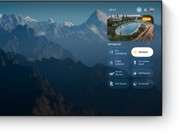 Apple TV denetim merkezi arayüzü düz ekran bir televizyonda g?rülüyor
