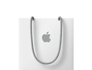 En hvit Apple-handlebag vises med gr? h?ndtak og en gr?, midtstilt Apple-logo.