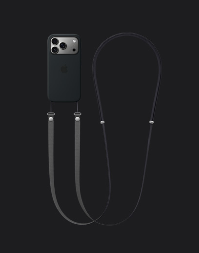 iPhone 17 Pro, achterkant, in de kleur Zilver, met zwart siliconenhoesje met MagSafe en een donkergrijs Crossbodykoord eraan vast