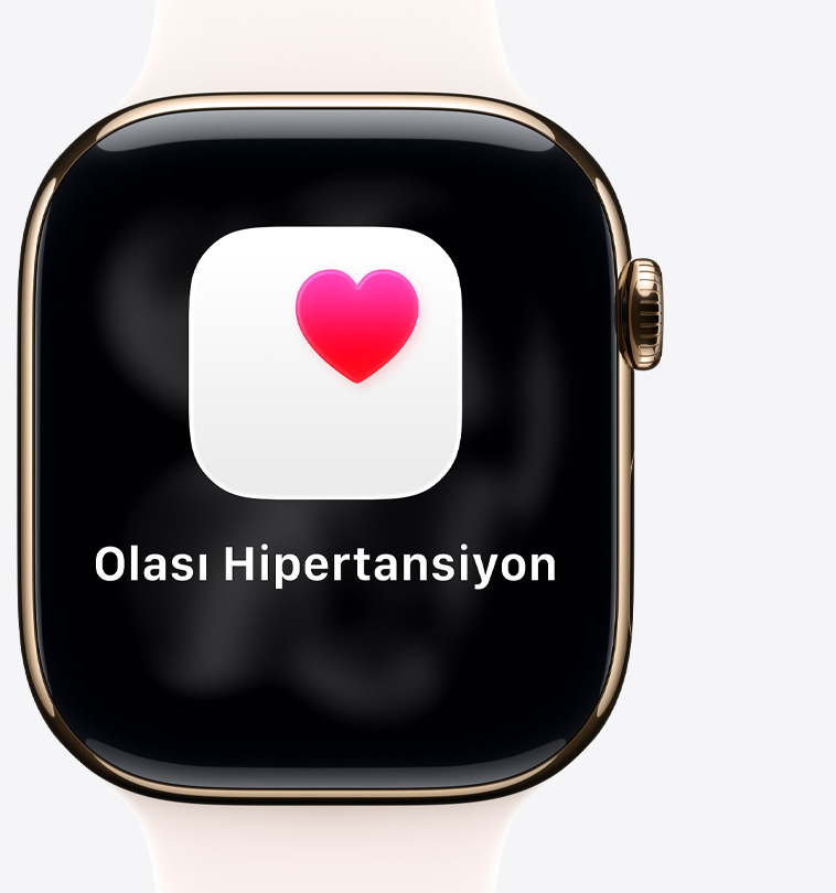 Apple Watch Series 11, titanyum kasa, parlak alt?n rengi, olas? hipertansiyon bildirimi, beyaz kutucuk i?inde pembe kalp, sa? d?? g?rünüm, Digital Crown, bulut pembesi Spor Kordon
