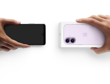 Deux mains échangeant un téléphone, un appareil Android sans bo?te à gauche, un nouvel iPhone 17 dans sa bo?te à droite